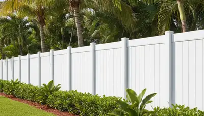 White privacy fence installation by Chop Chop Landscaping in Miami, FL showcasing expert craftsmanship